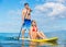 Couple Sharring Stand Up Paddle Board