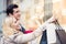 Couple at shop window doing Christmas shopping