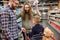 Couple showing convenience food to their son