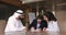 Couple signing agreement and shake hands Arabian advisor