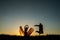 Couple silhouette dancing in the sunset