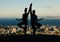 Couple, silhouette and yoga in spiritual fitness and wellbeing against a city background. Dark shadow of people in