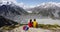 Couple sitting at mount top during hike