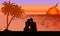 A couple sitting and watching the sunset and light silhouette twilight  on the beach