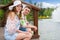 Couple sitting on the wooden deck