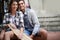 Couple, skateboarding and portrait in city, happy and excited to learn together and romantic relationship. Cape town