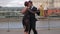 A couple of skilled tango dancers with performing a professional coreography