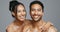 Couple, smile and care for skincare, happy and portrait for wellness in studio by gray background. Happy people