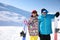 Couple with snowboards on hill. Winter vacation