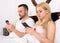 Couple socialising with mobile phones in bed