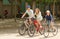 Couple with son on bicycles