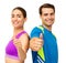 Couple In Sports Wear Gesturing Thumbs Up