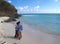 Couple Standing on Frys Beach in Antigua Barbuda