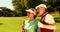 Couple standing on the golf course looking ahead