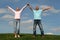 Couple Standing on Grass