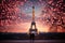 A couple is standing together, posing for a photo, in front of the iconic Eiffel Tower in Paris, Valentine