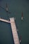 Couple stands on a wooden floating pier with guide pillars