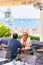 Couple at Street terraced cafe of Positano town