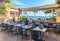 Couple at Street terraced cafe in Positano town