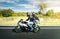 Couple on superfast motorcycle on French highway