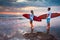 Couple of surfers walking on coast in Indonesia