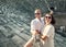 Couple take summer vacation photo with selfie stick in the ancient Theatre arena Side Antik Tiyatro,Turkey