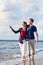 Couple take a walk at German north sea beach