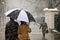 Couple takes a romantic walk in the snow