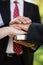 Couple taking an oath on bible during wedding