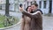 Couple taking self portrait with smartphone