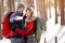 Couple taking selfie in forest