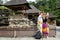 A couple taking selfie inside Pura Tirta Empul temple in Bali