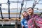 Couple taking selfie with Stockholm waterfront houses on background, Sweden