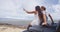 Couple Taking Selfie Using Smartphone While Sitting On SUV car Shipwreck Beach