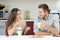 Couple talking in the kitchen