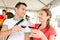 Couple tasting wine at event