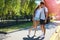 Couple teens in love walking in the park in summer day, youth