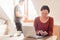 Couple telecommuting, woman and man working in home office