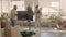 Couple in their house setting up an artificial Christmas fir tree. Full shot high-resolution jpg image.