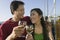 Couple Toasting Wine Glasses On Boat