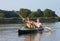 Couple of tourist kayaking along the river