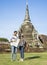 couple tourist looking at a map while visiting at Wat Phra Si Sanphet,concept of lifestyle, holiday, travel, .eco-tourism