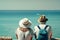 Couple tourists looks at beautiful azure sea in summer, back view. Ai generated