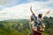 Couple of tourists making selfie on background of karst mountain