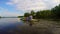 Couple of tourists paddling kayak down the river, slow motion