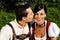 Couple in traditional Bavarian dress in summer