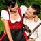 Couple in traditional Bavarian dress in summer