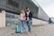 Couple travel with suitcases at the airport.