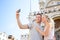 Couple on travel taking selfie photo Venice, Italy