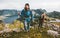 Couple travelers hiking in mountains family traveling